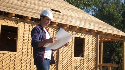 Concept building constructing architect slow motion video. lifestyle man builder Stock Footage 115983694