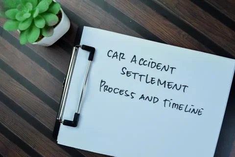 Concept of Car Accident Settlement Process and Timeline write on paperwork 스톡 사진
