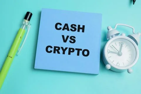 Concept of cash vs crypto write on sticky notes isolated on table. Stock Photos