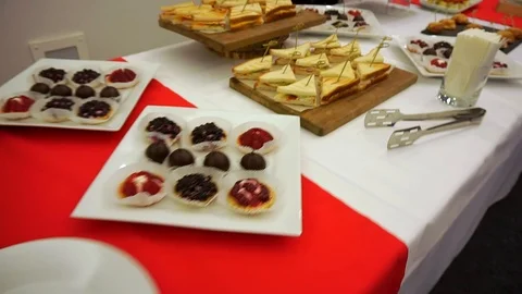 Concept catering. Snacks on the plates, stand on the table. 스톡 동영상 102897281