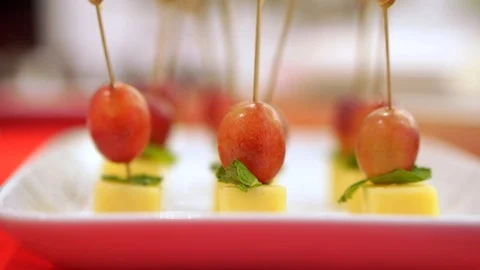 Concept catering. Snacks on the plates, stand on the table. Vídeos de archivo 102897406