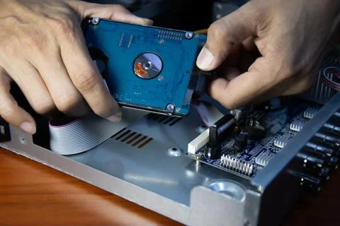 The concept of CCTV and IP camera users installing hard drives into their r.. Stock Photos