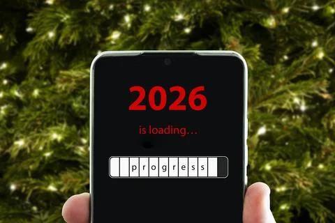 The concept of changing the year from 2025 to 2026. smartphone on the compute Stock Photos