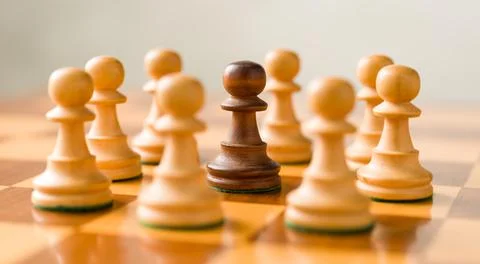 Concept with chess pieces -  Mobbing Stock Photos