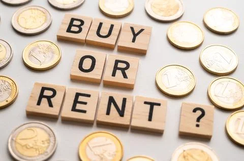Concept of choosing between renting and buying. Stock Photos