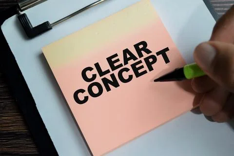 Concept of clear concept write on sticky notes isolated on Wooden Table. Stock Photos