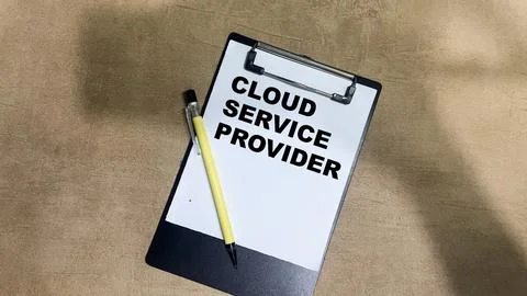 Concept of Cloud Service Provider write on paperwork isolated on Wooden Table Stockfoto's