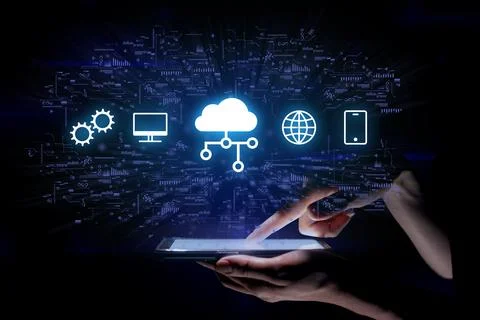 The concept of cloud technologies for data storage. Hand with tablet under Stock Photos