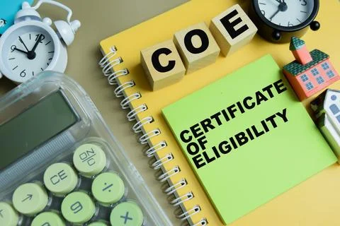 Concept of COE - Certificate Of Eligibility write on sticky notes Stock Photos