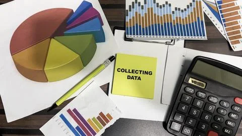 Concept of Collecting Data write on sticky notes isolated on Wooden Table. Foto stock