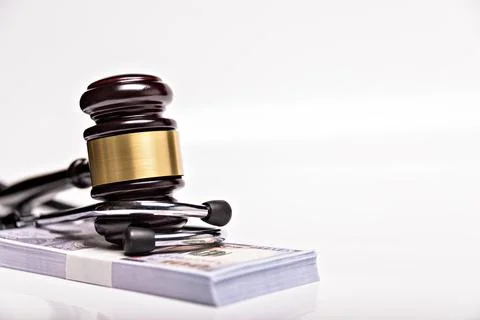 Concept of compensation for medical error in the application of treatment. White Stock Photos