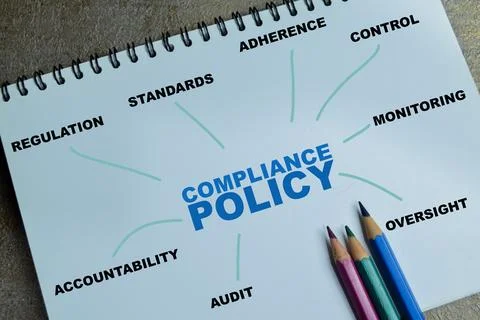 Concept of compliance policy with keywords write on book Stock Photos
