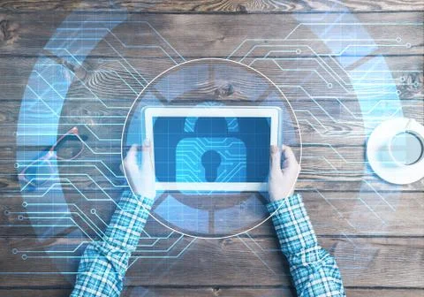 Concept of computer access with media lock icon on tablet screen Stock Photos