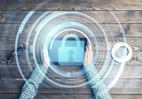 Concept of computer access with media lock icon on tablet screen Stock Photos