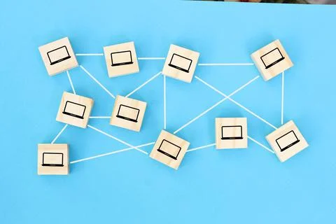 Concept of computer network or communication. Wooden cubes with computer icon Stock Photos