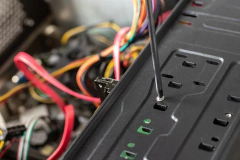 Concept of a computer repair. Hard drive instalation. Stock Photos