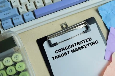 Concept of concentrated target marketing write on clipboard Stock Photos