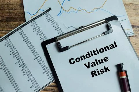 Concept of conditional value risk write on clipboard isolated on Wooden Table Stock Photos