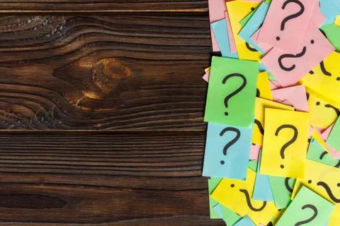 Concept for confusion, question or solution. question mark on wooden backgrou Stock Photos