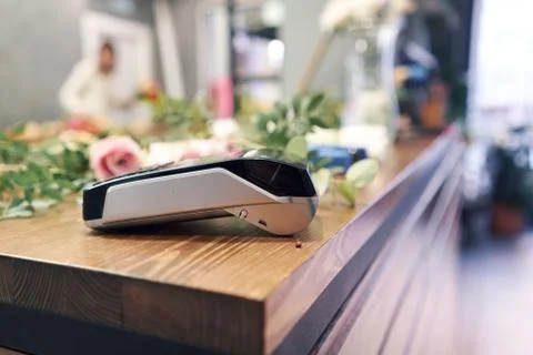 Concept contactless payment. Making payment with smartphone and pos terminal Stock Photos