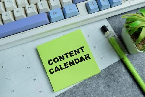 Concept of content calendar write on sticky notes isolated on Wooden Table. Stock Photos