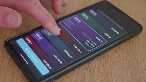 The concept of a convenient multi-currency bank account. Finger tapping 스톡 동영상 337998153