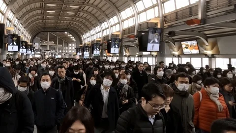 Concept of coronavirus quarantine, MERS-Cov. Large crowd of people.-Dan Stock Footage 124397192