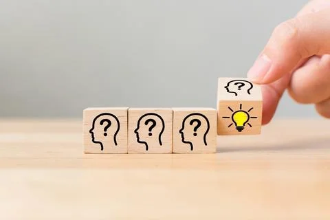 Concept creative idea and innovation. Hand flip over wooden cube block with.. Stock Photos