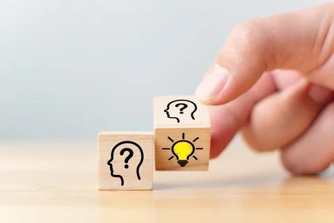 Concept creative idea and innovation. Hand flip over wooden cube block with.. Stock Photos