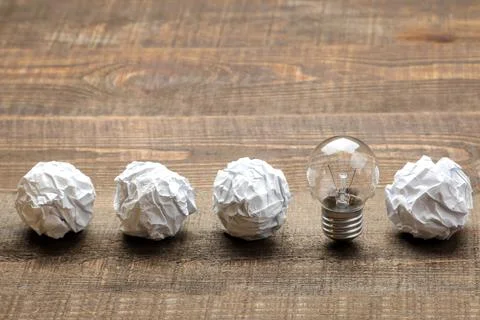 Concept creative idea. concept of creative idea. Bulbs of crumpled paper and Stock Photos