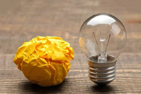 Concept creative idea. concept of creative idea. Bulbs of crumpled paper and Stock Photos