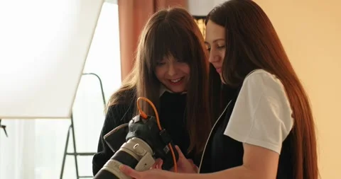 The concept of creative work in a photo studio, behind-the-scenes work. Stock Footage 279914773