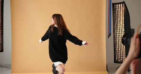 The concept of creative work in a photo studio, behind-the-scenes work. Stock Footage 279914862