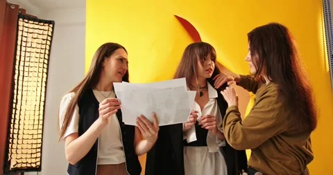 The concept of creative work in a photo studio, behind-the-scenes work. Stock Footage 279915250