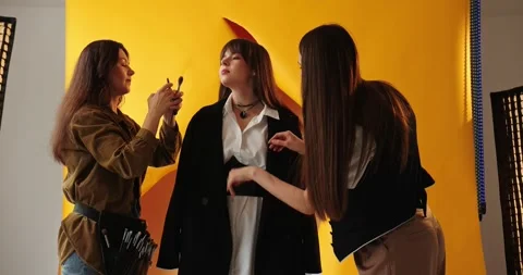 The concept of creative work in a photo studio, behind-the-scenes work. Video stock 279915444