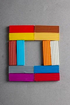 Concept of creativity. colorful plasticine in square. Puzzle Stock Photos