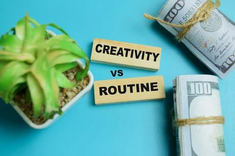 Concept of creativity vs routine text on wooden blocks. 写真素材