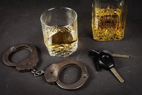 Concept of criminal liability for driving while intoxicated. Bakal with cogna Foto stock