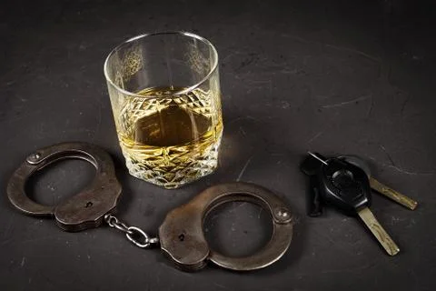 Concept of criminal liability for driving while intoxicated. Bakal with cogna Stock Photos