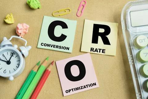 Concept of CRO - Conversion Rate Optimization write on sticky notes Stock Photos
