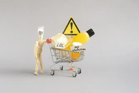 The concept of the danger of products containing trans fats. Stock Photos
