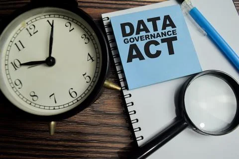 Concept of Data governance act write on sticky notes isolated on Wooden Table Stock Photos