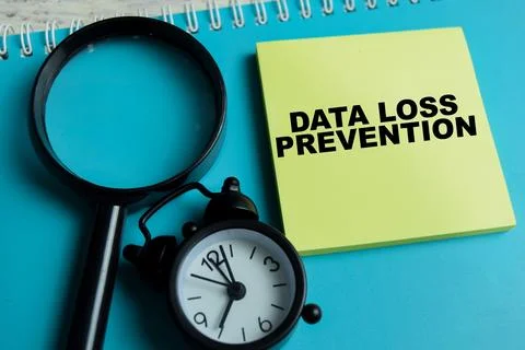 Concept of data loss prevention write on sticky notes isolated on Wooden Table Stock Photos