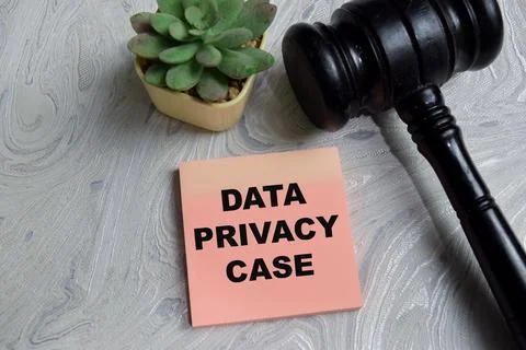 Concept of data privacy case write on sticky notes isolated on Wooden Table. Stock Photos
