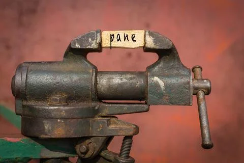 Concept of dealing with problem. Vice grip tool squeezing a plank with the wo Stock Illustration