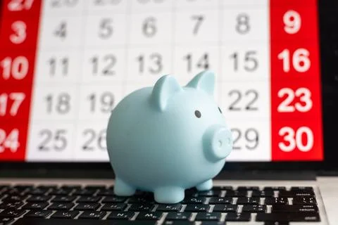 Concept of Debt. By throwing a clean white calendar, specify debt, expenses that Stock Photos