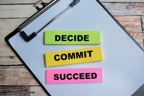 Concept of Decide Commit Succeed write on sticky notes Stock Photos