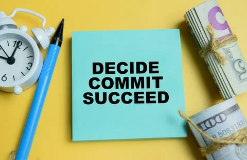 Concept of decide, commit, succeed write on sticky notes isolated on table. Stock Photos