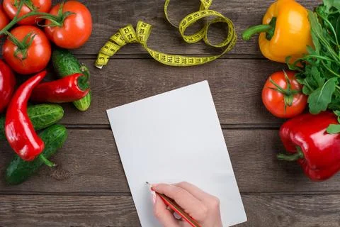 Concept diet, slimming plan with vegetables top view mock up Stock Photos