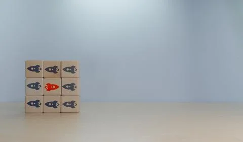 The concept is different. The red rocket goes opposite to the other rockets Foto stock